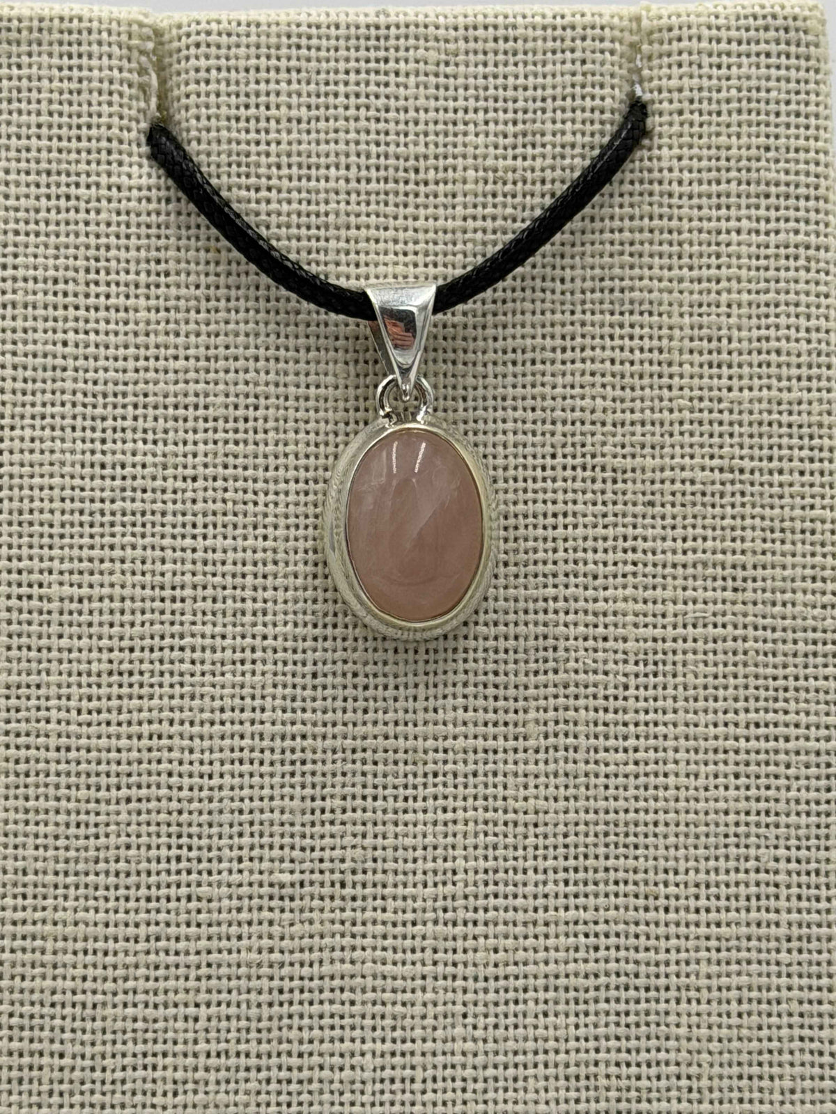 Sterling Silver Bezeled Oval Rose Quartz Pendant