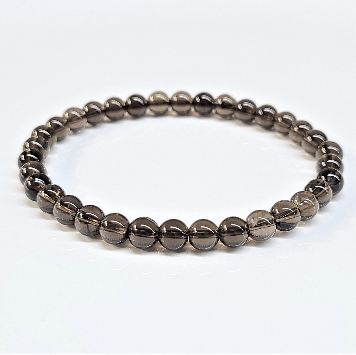 Smoky Quartz Round Bead Bracelet - Stone of Strength & Stability